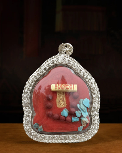 Silver-Cased Yellow Jambhala for protection