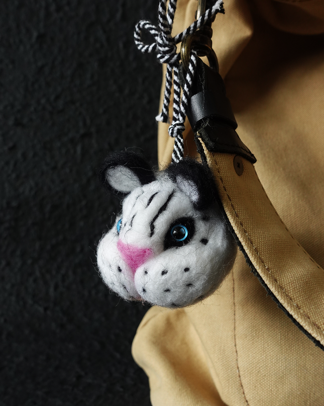 Snow Leopard wool felt bag pendant