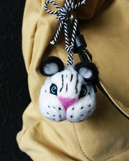 Snow Leopard wool felt bag pendant