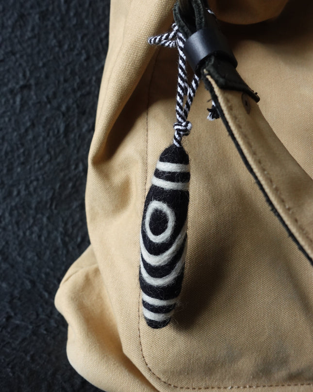 Dzi Bead wool felt bag pendant
