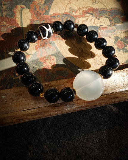 Tibetan Black Onyx Bracelet with Jambhala Buddha Eye & Turtle-Back Longevity Bead