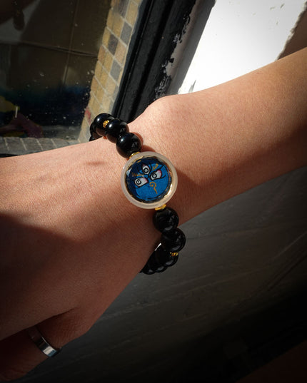 Tibetan Black Onyx Bracelet with Jambhala Buddha Eye & Turtle-Back Longevity Bead