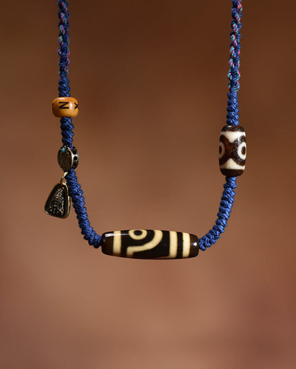 Prosperity Guardian Two-Eyed Dzi Pendant
