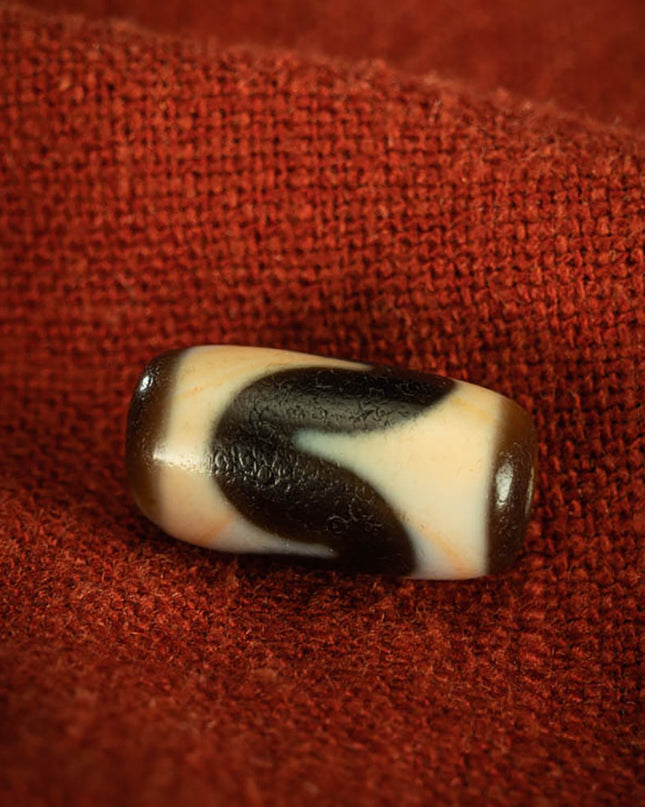 Red-Infused Dzi Pendant – Small but Mighty Energy Charm