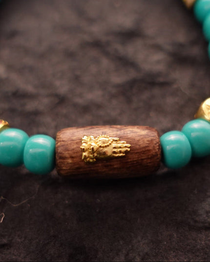 Prosperity & Healing Turquoise Bracelet with Buddha Charm