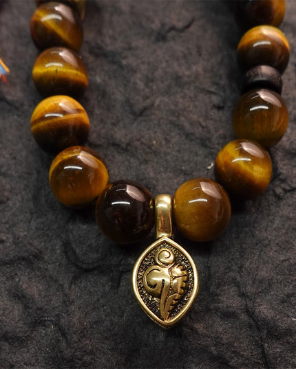 Wealth & Strength Tiger's Eye Bracelet with Gold Buddha Charm