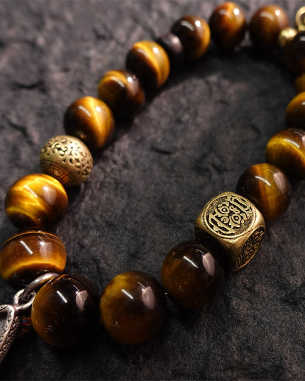 Wealth & Strength Tiger's Eye Bracelet with Gold Buddha Charm