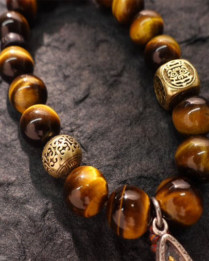 Wealth & Strength Tiger's Eye Bracelet with Gold Buddha Charm