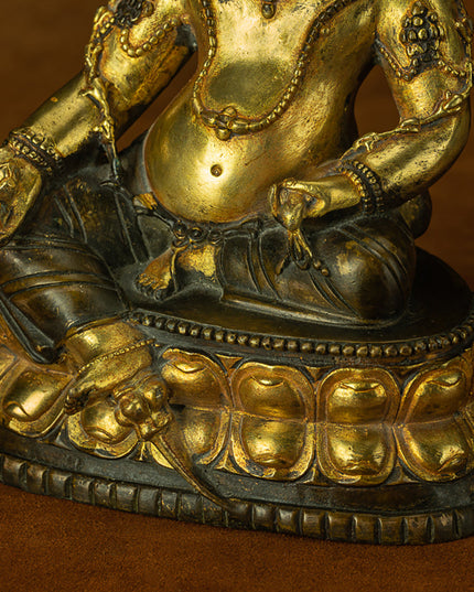 Yellow Dzambhala Statue – Purple Zilima Copper Wealth Sculpture