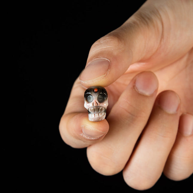 Courage Talisman Pendant – Nine-Eye Skull Dzi Bead with Gemstone Inlay